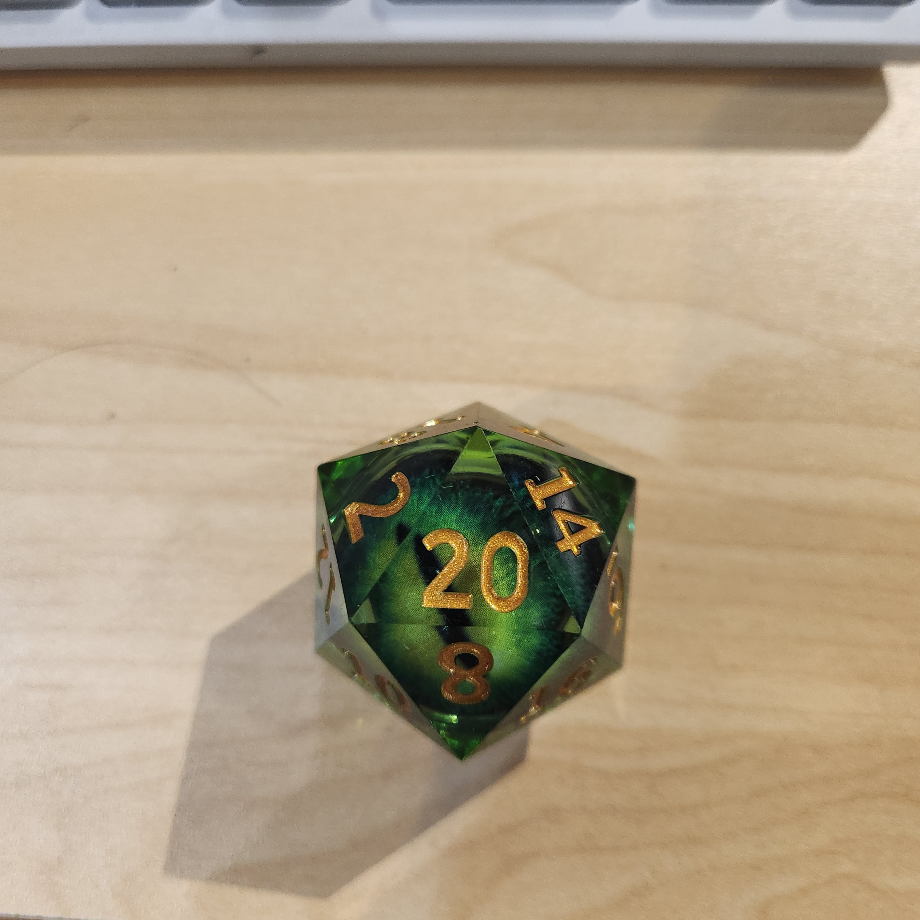 Liquid Core - Green Crocodile Eye - Medium d20