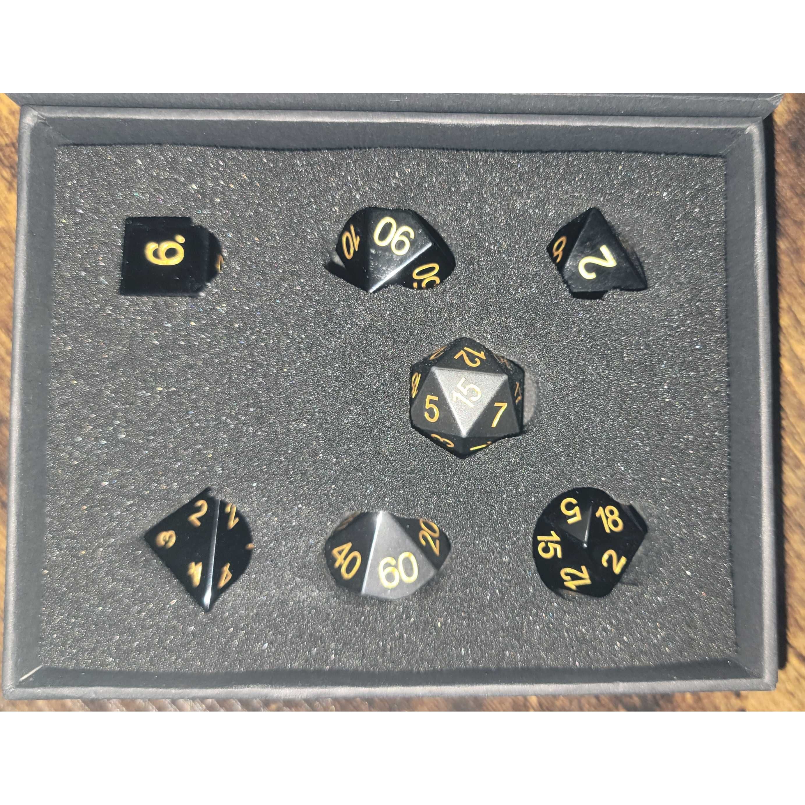 Black and Gold 7-set Hematite Dice, Used